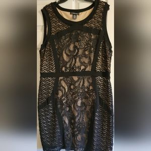 Black lace bodycon dress with nude underlayer
